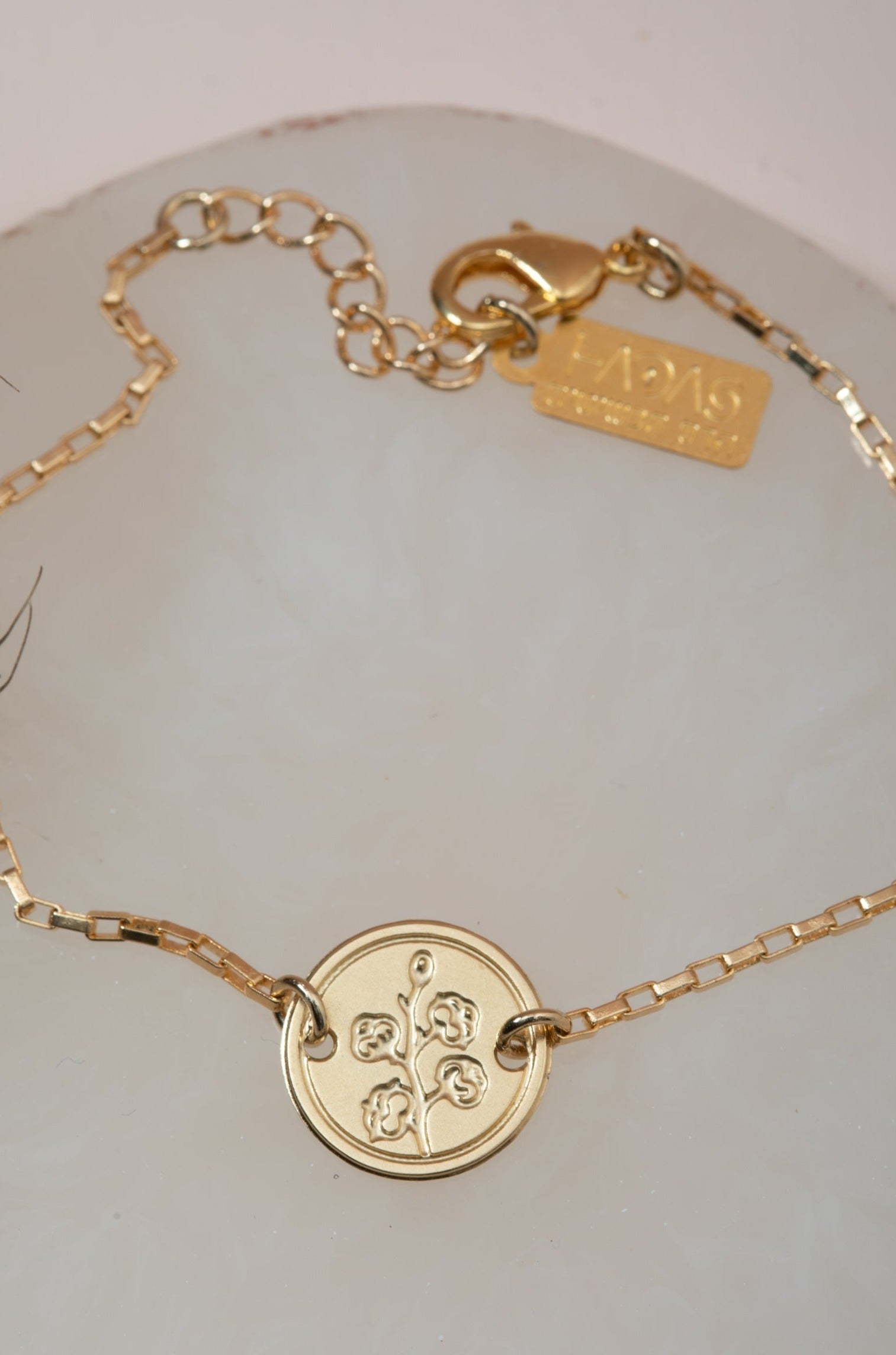 "צמיד עיגול כותנה, עם המילים "הכל אפשרי